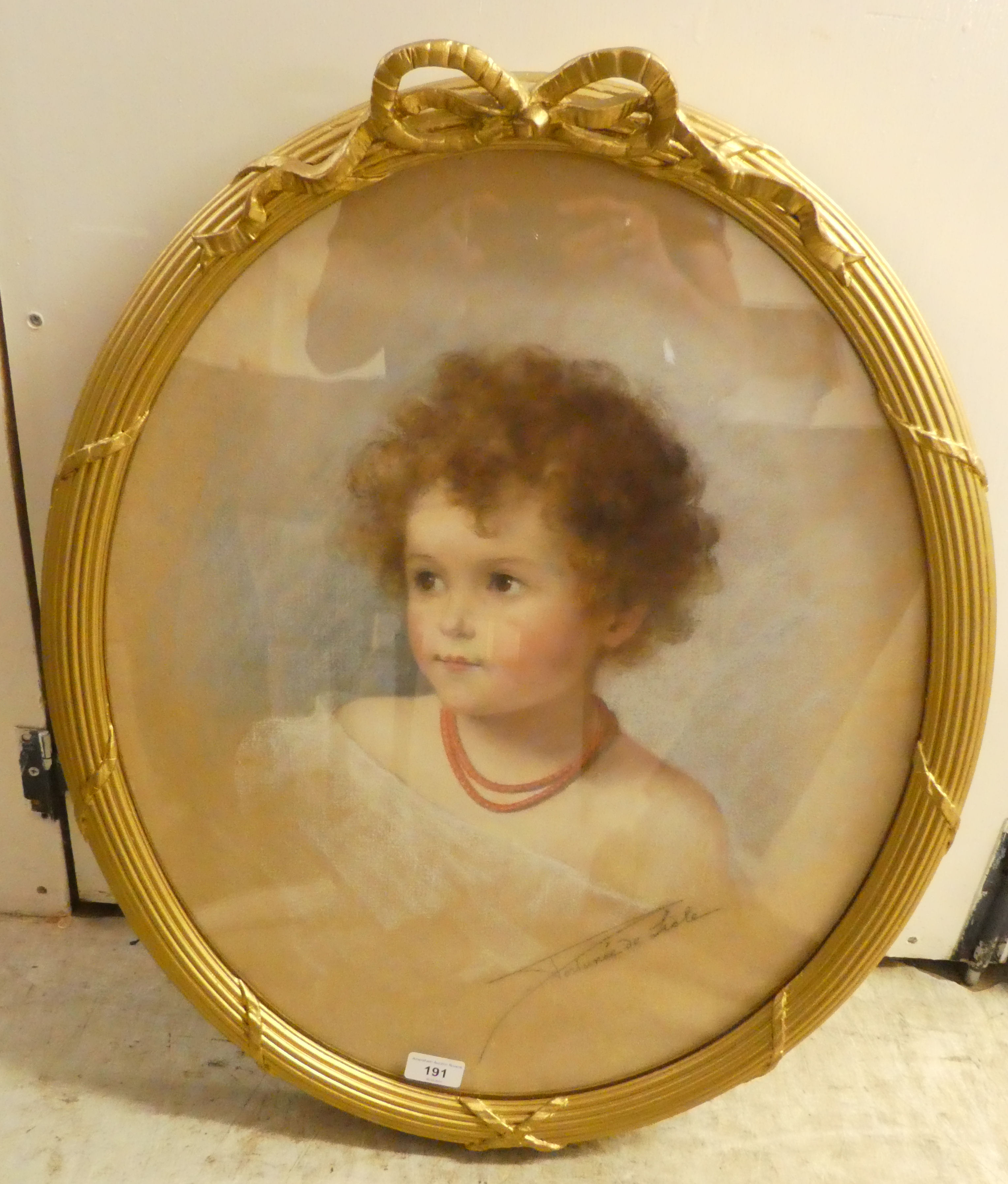 Fortunee de Lisle - a head and shoulders portrait of a young girl  pastel  bears a signature  23"
