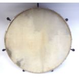 A Bodhran drum with five pegs  19"dia