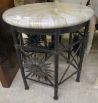 A modern metal occasional table with a painted stone effect top, raised on pillar design legs  25"h