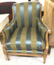 A modern Louis XV design stained beech framed salon chair, upholstered in green stripped fabric,
