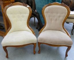 A pair of modern stained beech showwood spoonback bedroom chairs, part button upholstered in cream