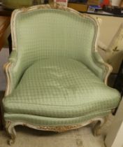 A modern Louis XV design cream painted, green fabric upholstered salon chair, raised on cabriole