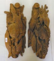 Two carved wooden mixed animal themed plaques  8" x 20"