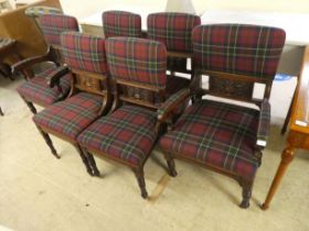 A set of six late Victorian oak framed dining chairs, each with a tartan fabric upholstered back and