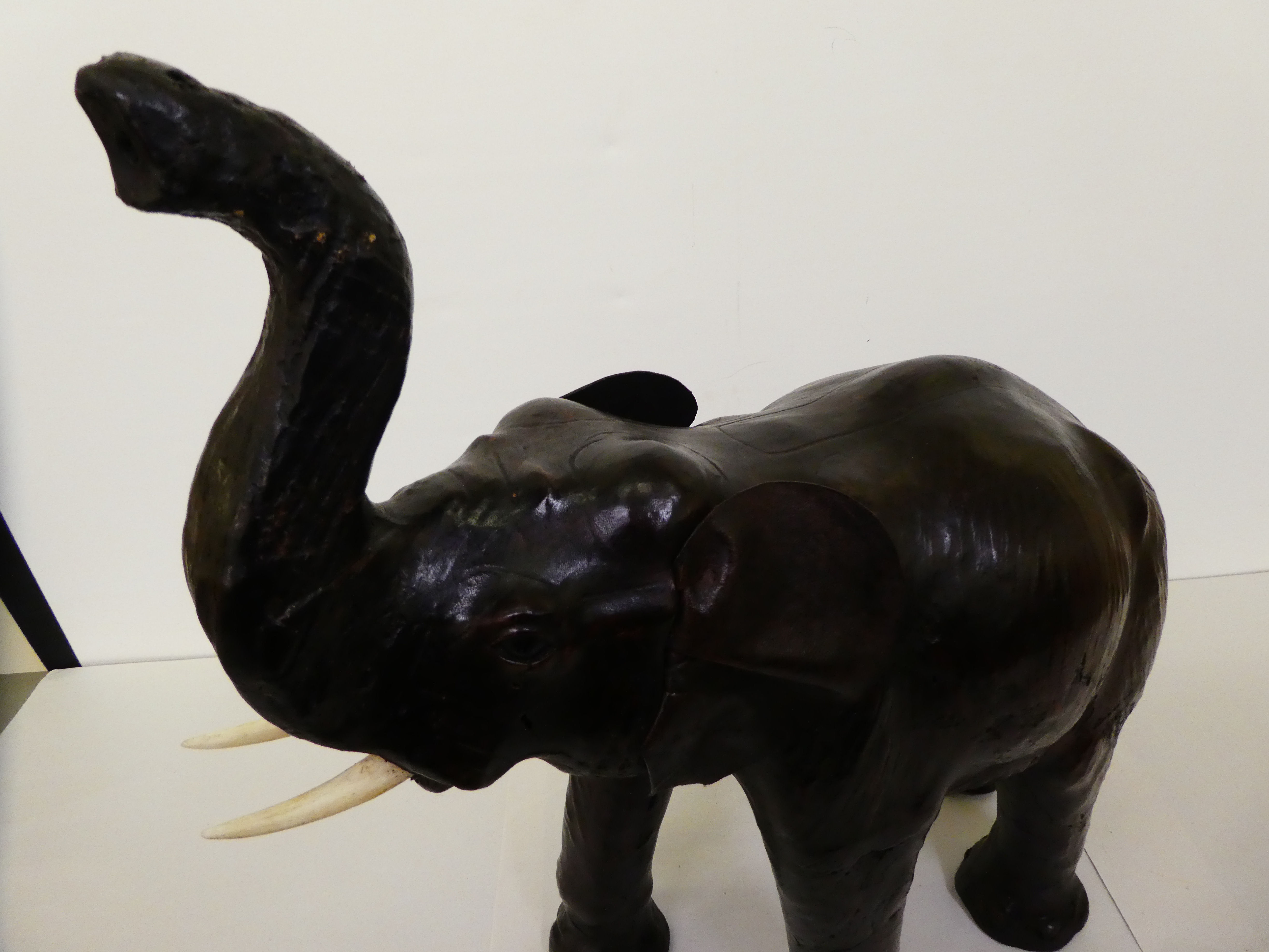 A Liberty's inspired, moulded and stained leather model, a trumpeting elephant  21"h - Image 2 of 6
