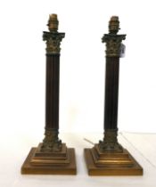 A pair of wooden and brass Corinthian column table lamps  18"h