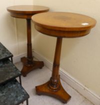 A pair of modern William IV design mahogany and walnut pedestal tables, each with a turned column