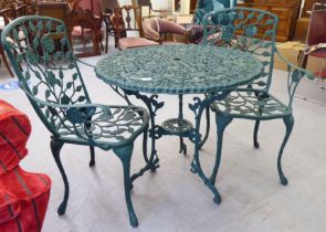 A modern Victorian style green painted patio table  30"h  30"dia; and a pair of matching elbow