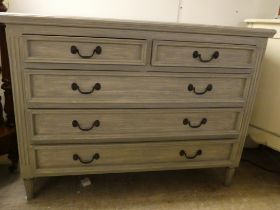A modern blue painted dressing chest with two short/three graduated long drawers, raised on turned