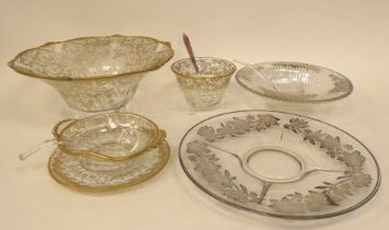 Decoratively gilded and silvered glass tableware: to include a fruit bowl and servers
