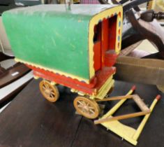 A scratch built, carved and painted model gypsy caravan  16"h