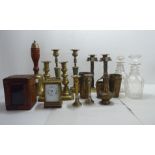 A mixed lot: to include a brass cased carriage timepiece 5"h; a school bell; and two decanters