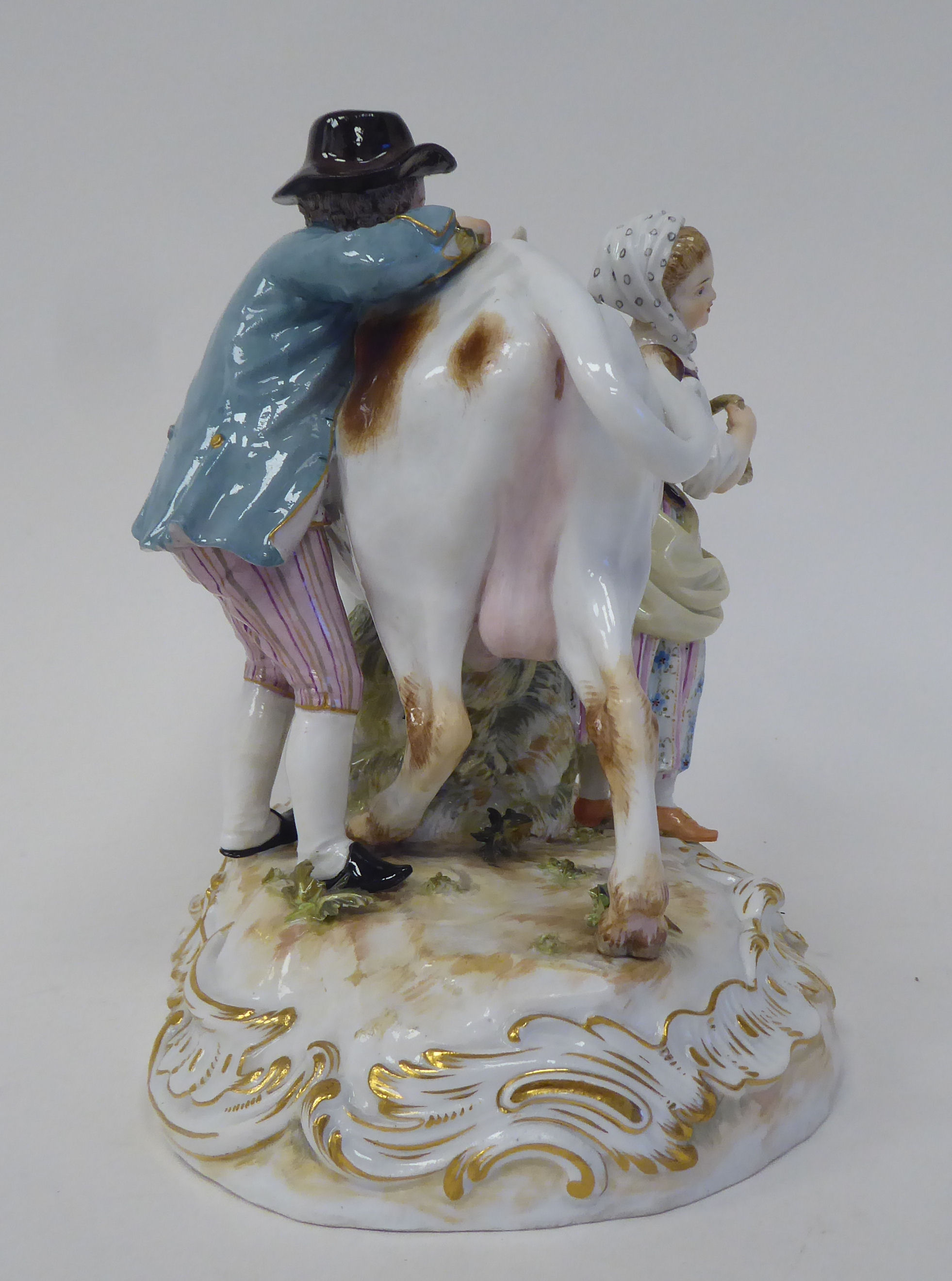 A Meissen porcelain group, featuring a cow, a milkmaid and her suitor  inscribed R78, on an oval - Image 4 of 8