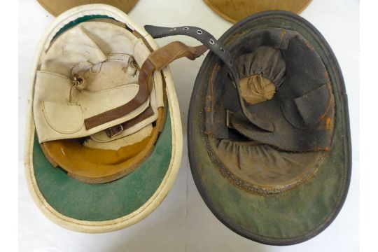 A selection of formal and other hats/helmets: to include two tan coloured pith helmets - Image 6 of 9