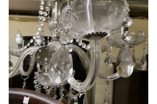 A modern crystal chandelier with six scrolled branches, trailing pendants and beads  24" spread - Image 3 of 3