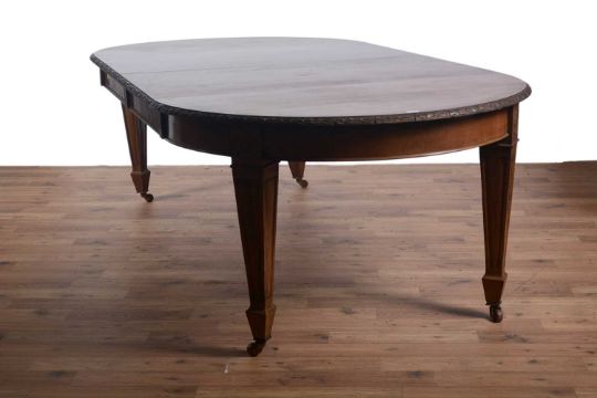 An Edwardian extending dining table - Image 2 of 5