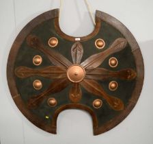 A leather and copper mounted shield