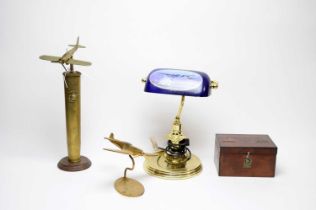 A collection of military interest memorabilia and desk accessories