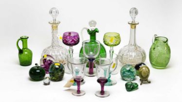 A selection of coloured and cut glass ware