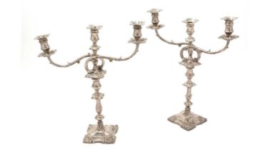 A pair of Old Sheffield plated three-light candelabra