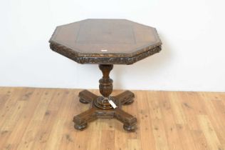 A Victorian inlaid oak table of octagonal form