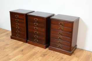 A set of three reproduction mahogany music cabinets