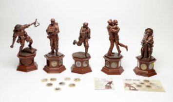 A collection of five bronzed resin Danbury Mint World War II military figures