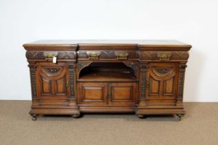 A large late Victorian mahogany breakfront sideboard