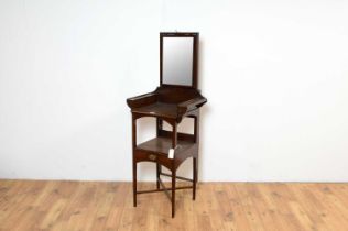 A 19th Century mahogany washstand, with a retractable tilt action mirror.