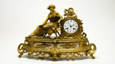 A late 19th Century French figural mantel clock