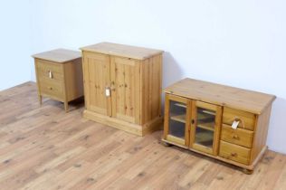 A Modern Ercol two drawer bedside cabinet together with two others