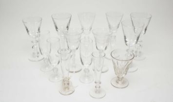 A collection of antique wine and other glasses