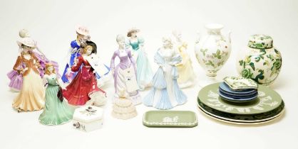 A selection of decorative ceramic figures of ladies