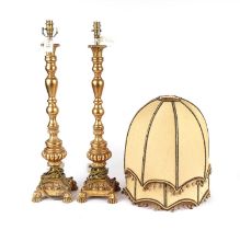 A pair of 20th Century gilt coloured lamps and shades
