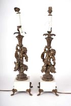 A pair of 20th Century brass lamps and shades