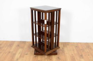 An Edwardian inlaid mahogany revolving bookcase