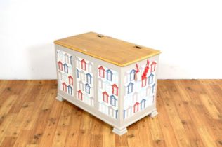 A modern painted oak children's toy chest