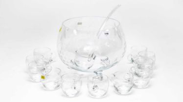 An etched glass punch bowl or mulled wine serving set
