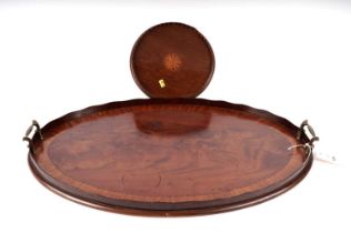 A walnut oval serving twin handled tray