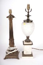 Two 20th century brass lamps, and a selection of shades