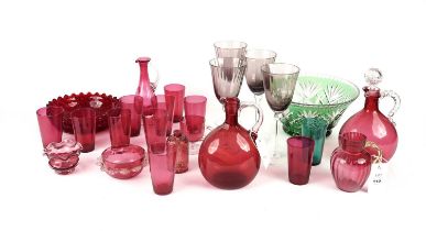 A collection of Victorian and later cranberry glass ware
