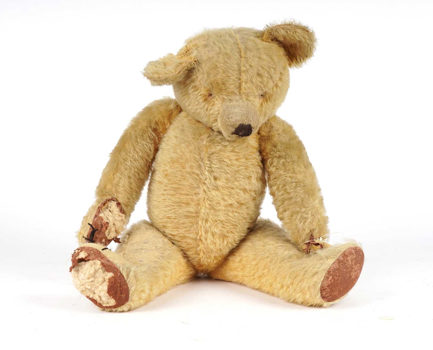 A vintage stuffed teddy bear