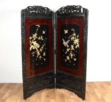 A decorative Chinese Oriental two panel dressing screen