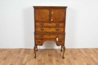 A Queen Anne style walnut and burr-walnut tallboy