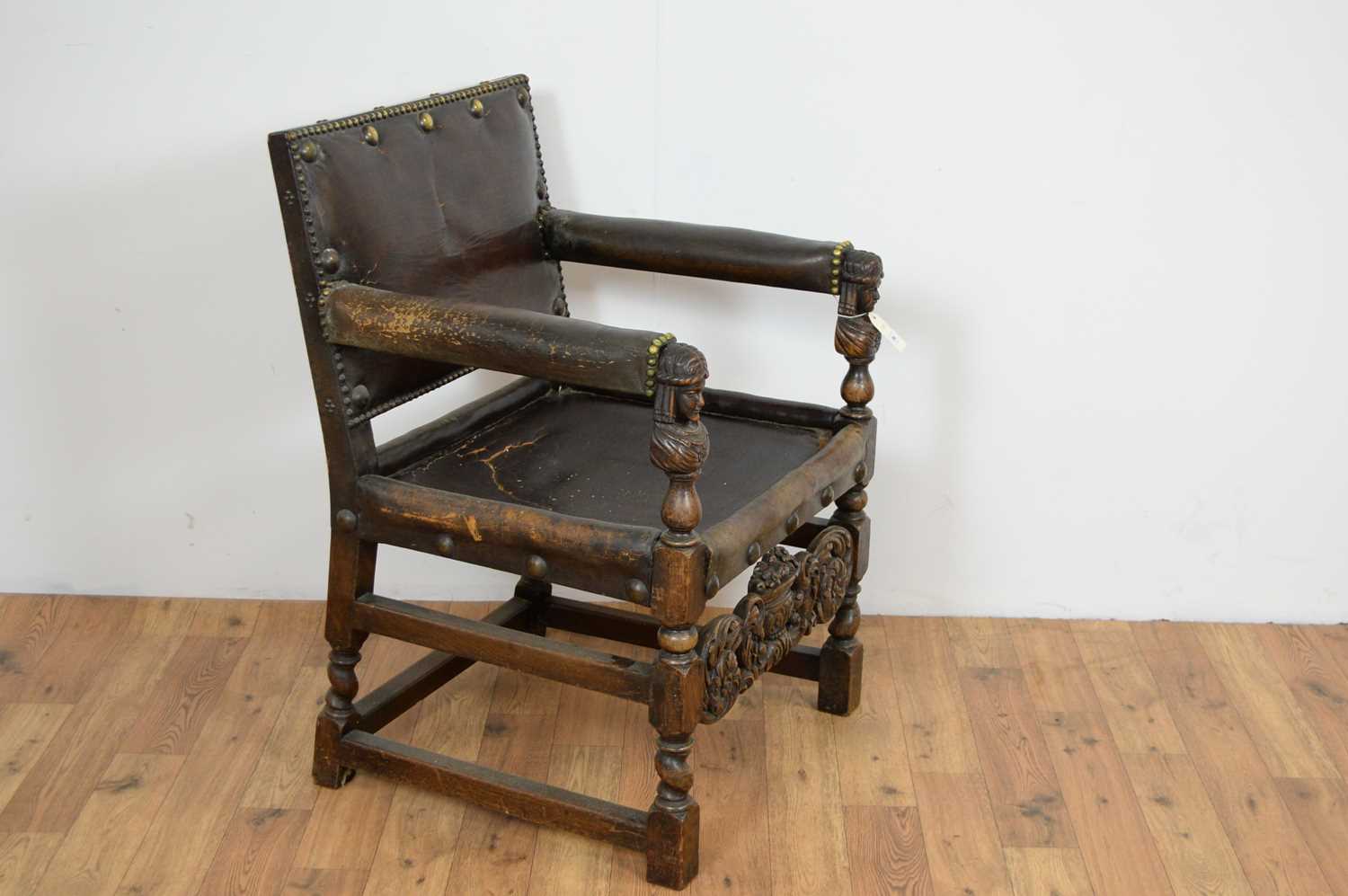 A 20th Century carved oak and leather chair - Image 3 of 5