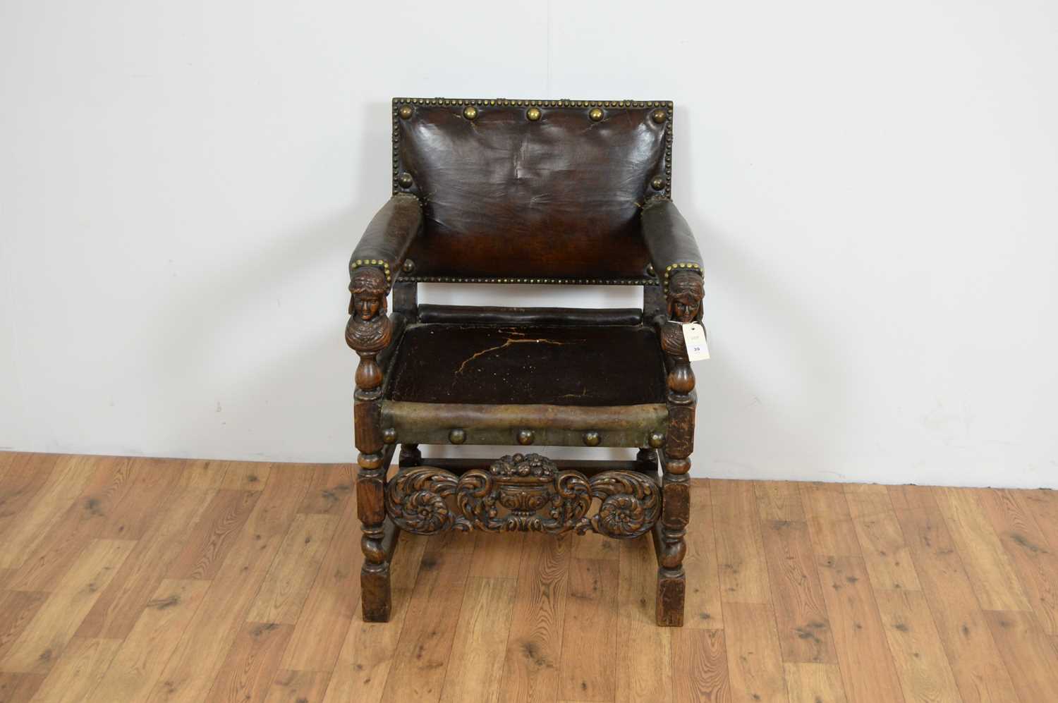 A 20th Century carved oak and leather chair - Image 2 of 5