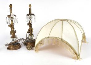 A pair of 20th Century brass lamps