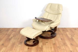 Stressless Ekornes; A retro reclining swivel easychair with matching footstool