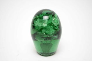 A 19th Century green glass dump paperweight