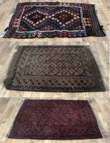 A 20th Century kilim rug, a 20th Century Turkman Islamic rug and a vintage 20th Century Turkman rug